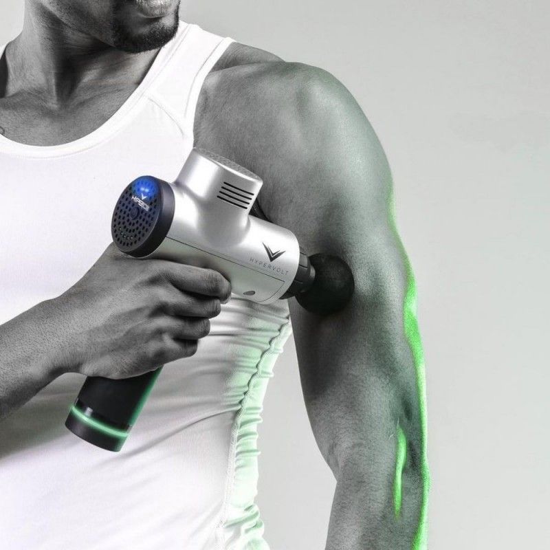 Sportif avec pistolet de massage Hypervolt Sportif avec pistolet de massage Hypervolt