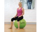Femme assise sur le ballon de gym SISSEL® SECUREMAX® Ø45 cm vert
