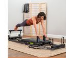 Entrainement Pilates avec le Metro™ IQ® Reformer Balanced Body® rangement lit