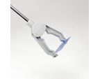 La Pince de préhension Pick-Up Homecraft® en train d'attraper un objet fin