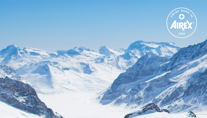 Photo de d'un montagne suisse pour présenter le tapis de yoga AIREX® Pilates 190